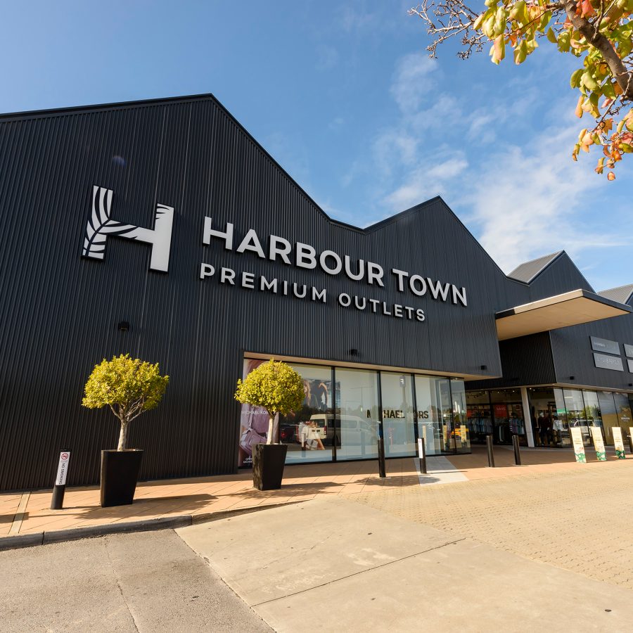 The exterior of Harbour Town Premium Outlets is a geometric structure.