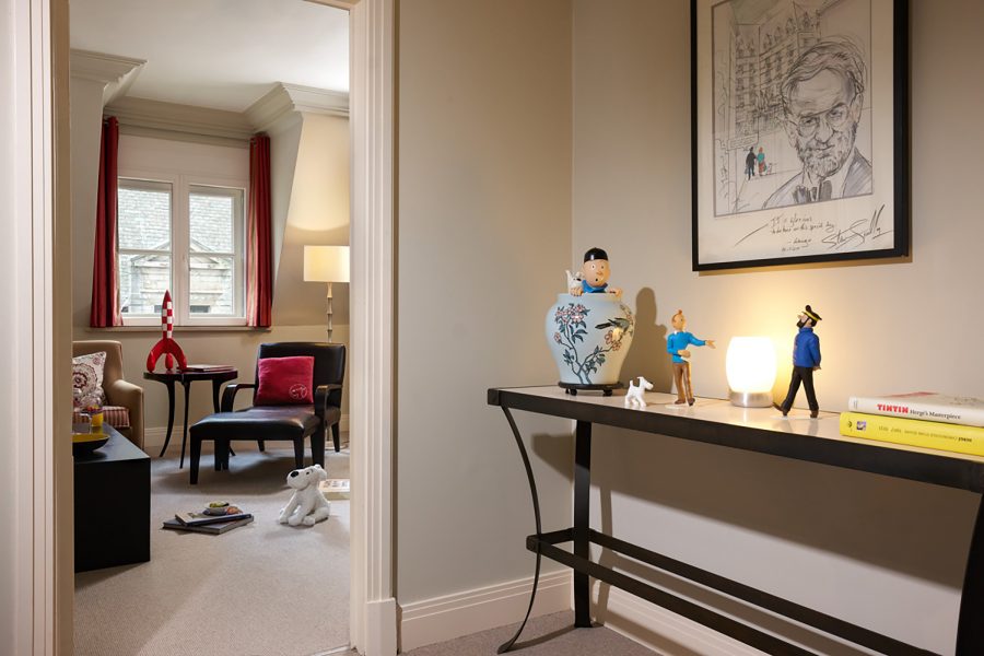 An interior view of Rocco Forte Hotel Amigo’s Tin Tin Detective family room.