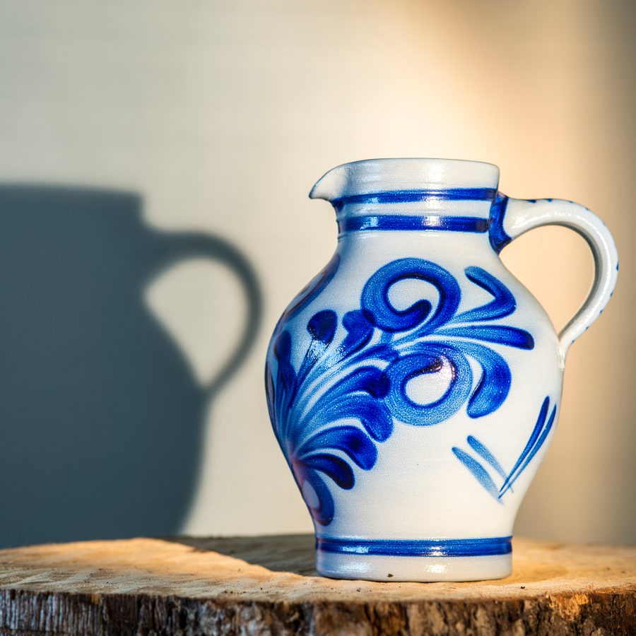 A decorative blue-and-grey Bembel jug.