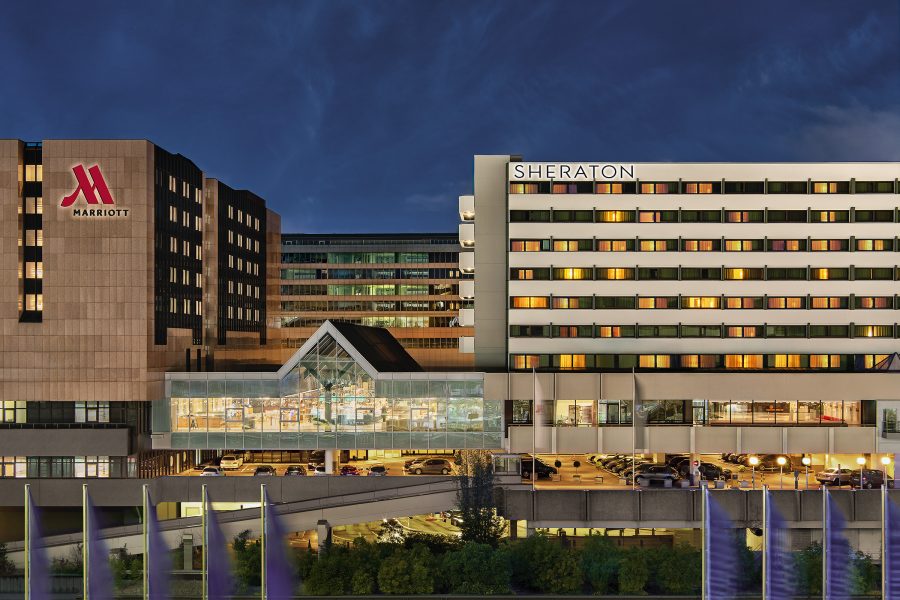 Exterior view at dusk of the Marriot Frankfurt Airport hotel.