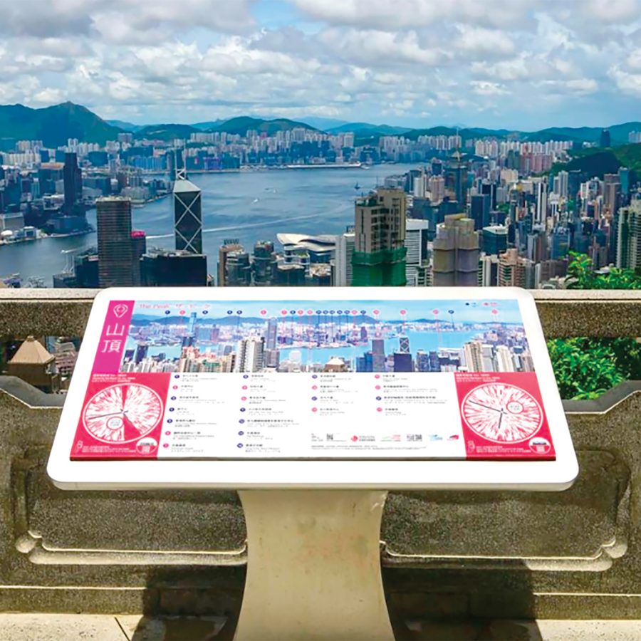 A sign shows the landmarks of Hong Kong Island from up on Victoria Peak.