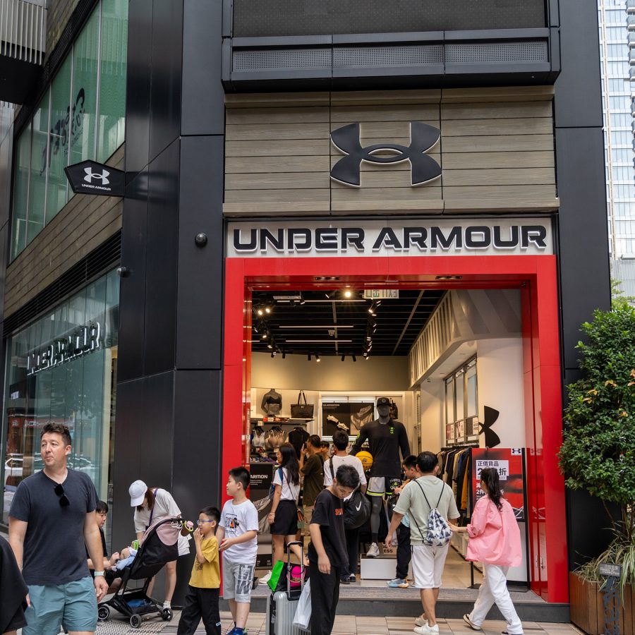 A crowded street view of an athletic wear shop in Sneakers Street in Mong Kok, Hong Kong