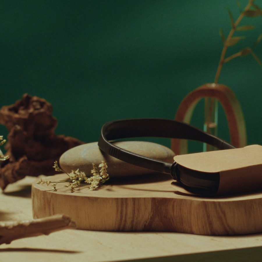 Cathay’s inflight headset in paper packaging along with other inflight goods.