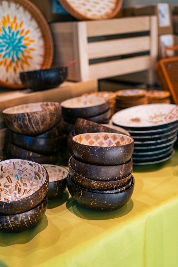 Stacked coconut bowls for sale in Haikou.