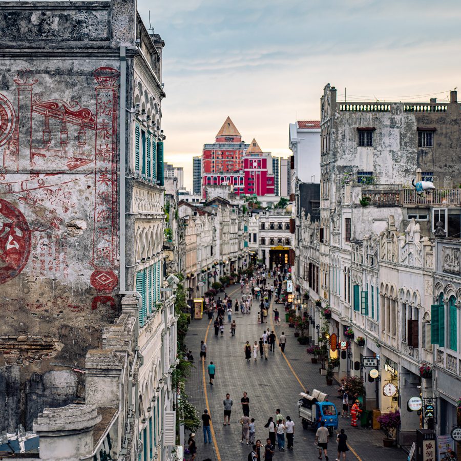 Shot of Haikou’s old city with people streaming through the streets.