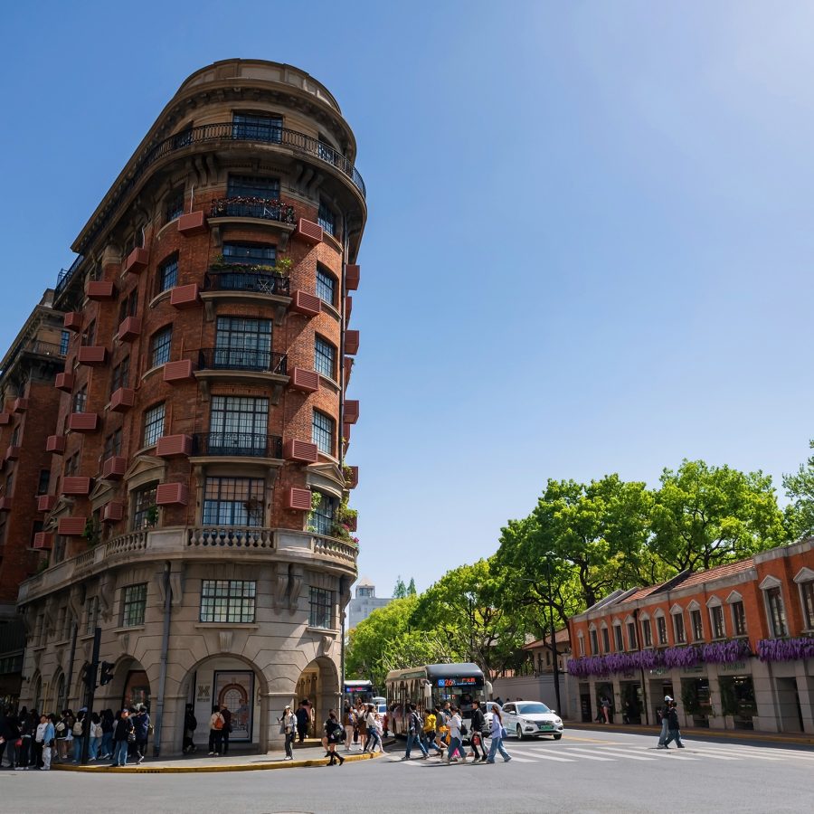 A streetview of Wukang Mansion in Shanghai, China on a sunny day