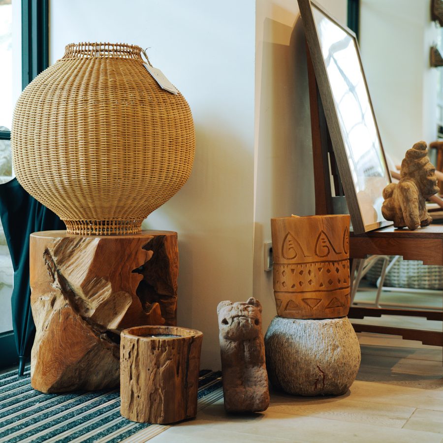 Woven baskets and wooden carvings are displayed at Guangzhou store Oasis Object.