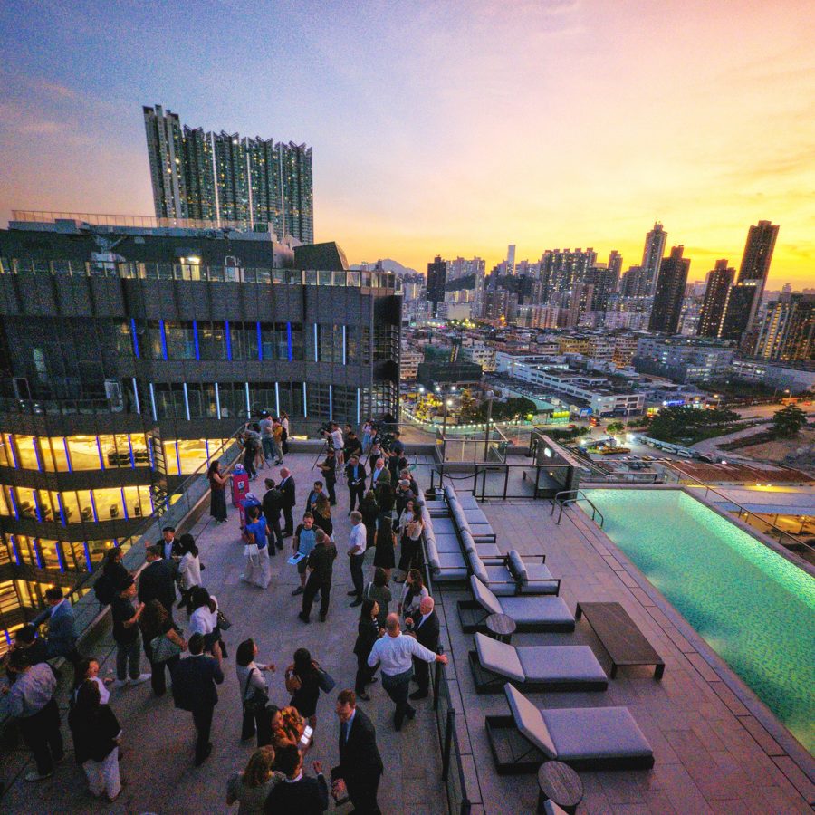 An aerial view of Jin Bo Law shows diners mingling on the deck next to the pool.