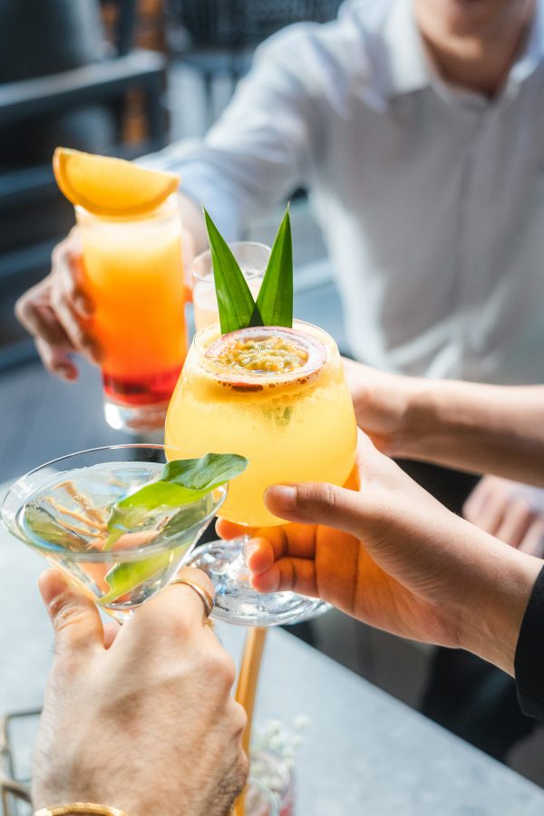 Diners clink their cocktail glasses at SPIGA.