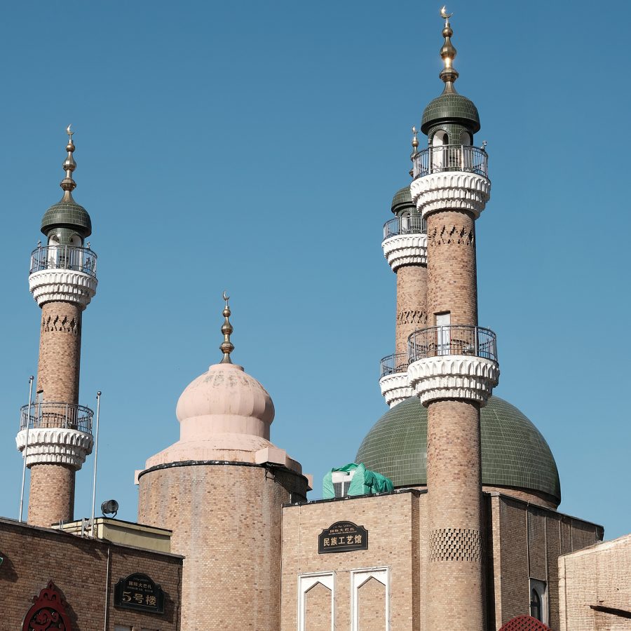 Erdaoqiao Mosque in Urumqi, with towers and a green dome.