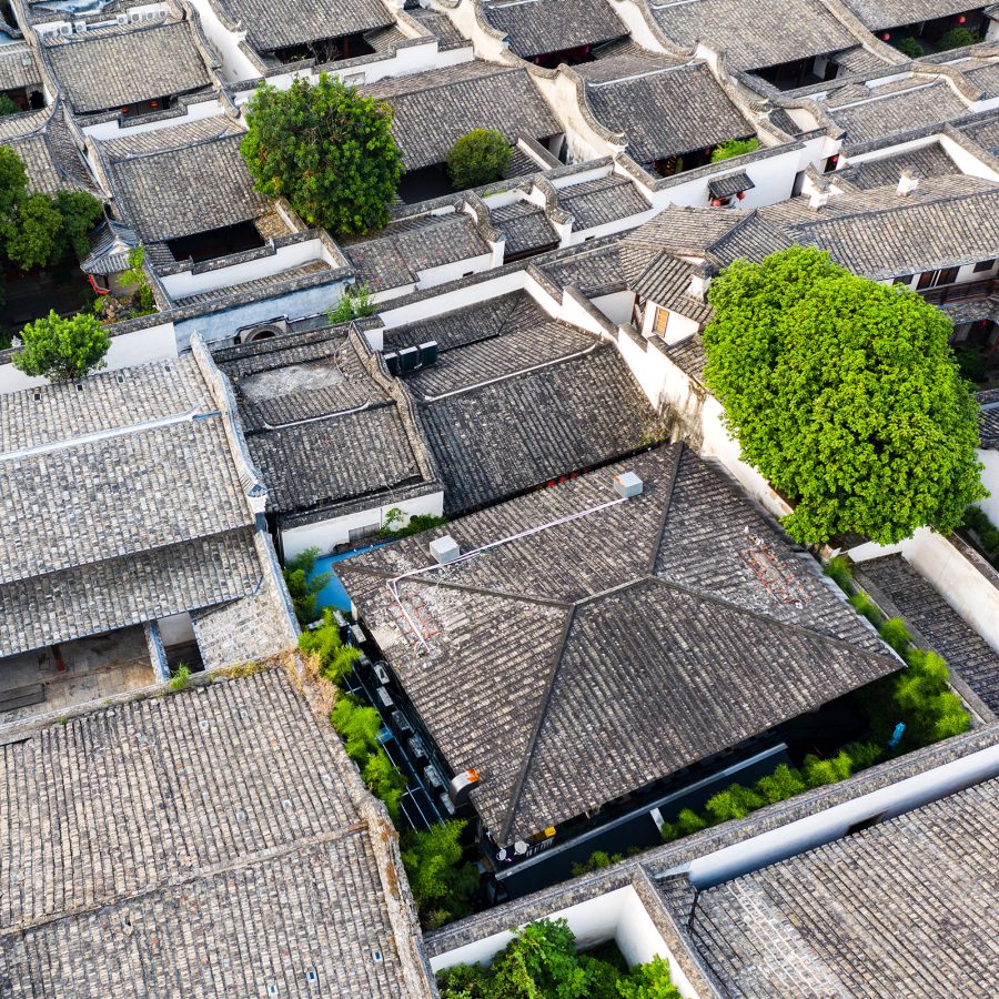 Bird’s eye shot of three-tier courtyard houses and trees in Fuzhou’s Sanfang Qixiang.