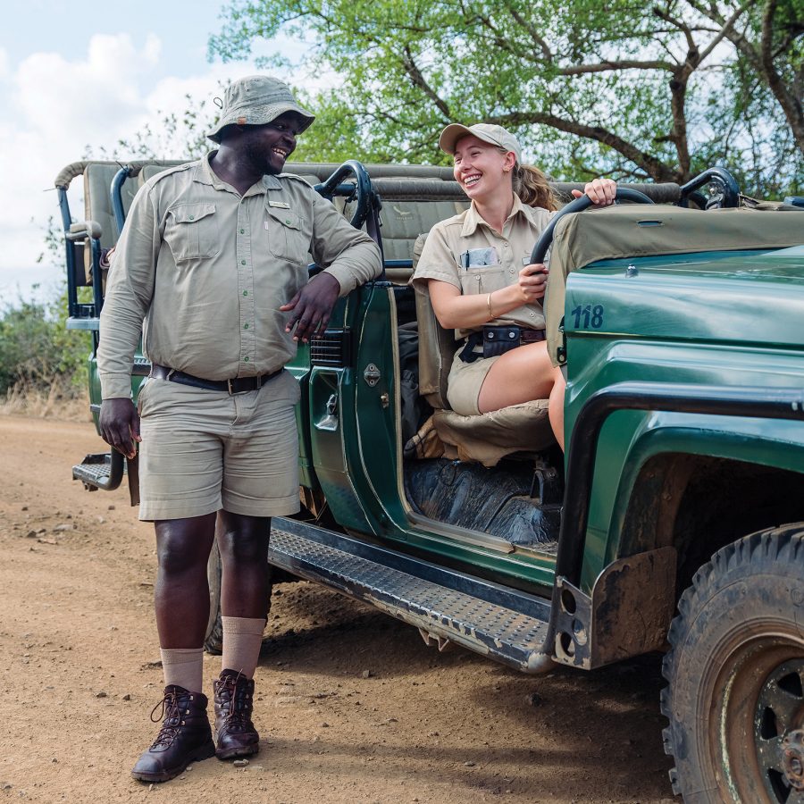 Tracker Bongumenzi “Menzi” Dumsani and guide Gem Louw, posed with their vehicle.