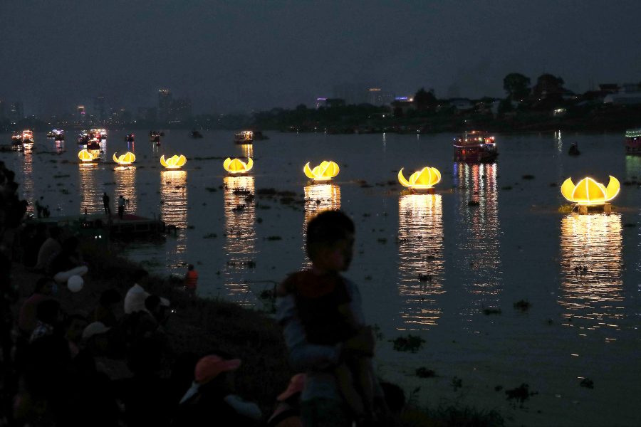 Floating lotus-shaped lanterns sit on the water in Cambodia as part of Bon Om Touk.