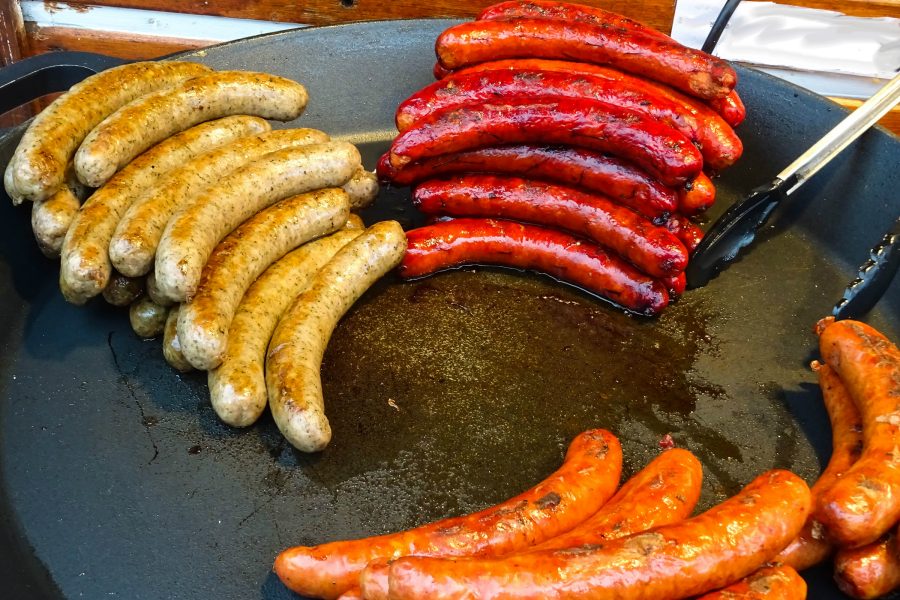 Sausages being grilled at a Prague Christmas market.