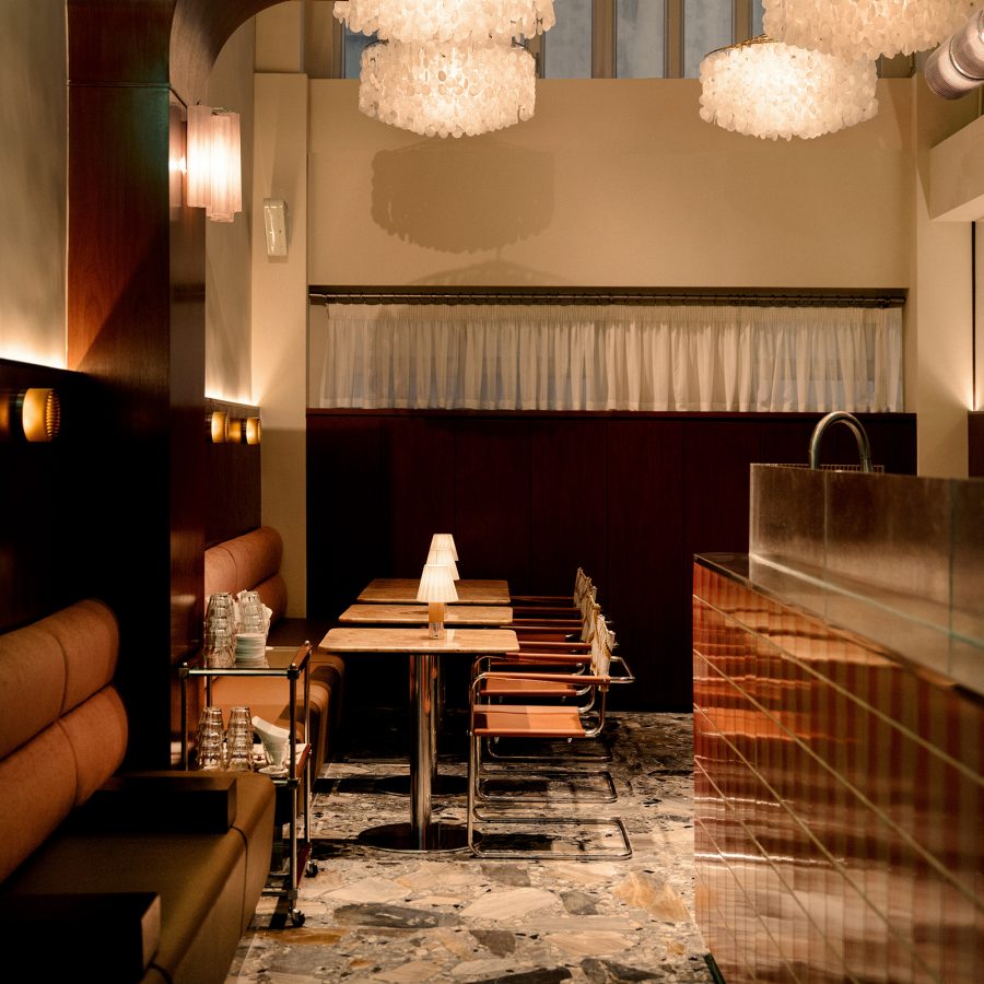 The interior of Snack Baby is sleek and stylish with warm lighting.