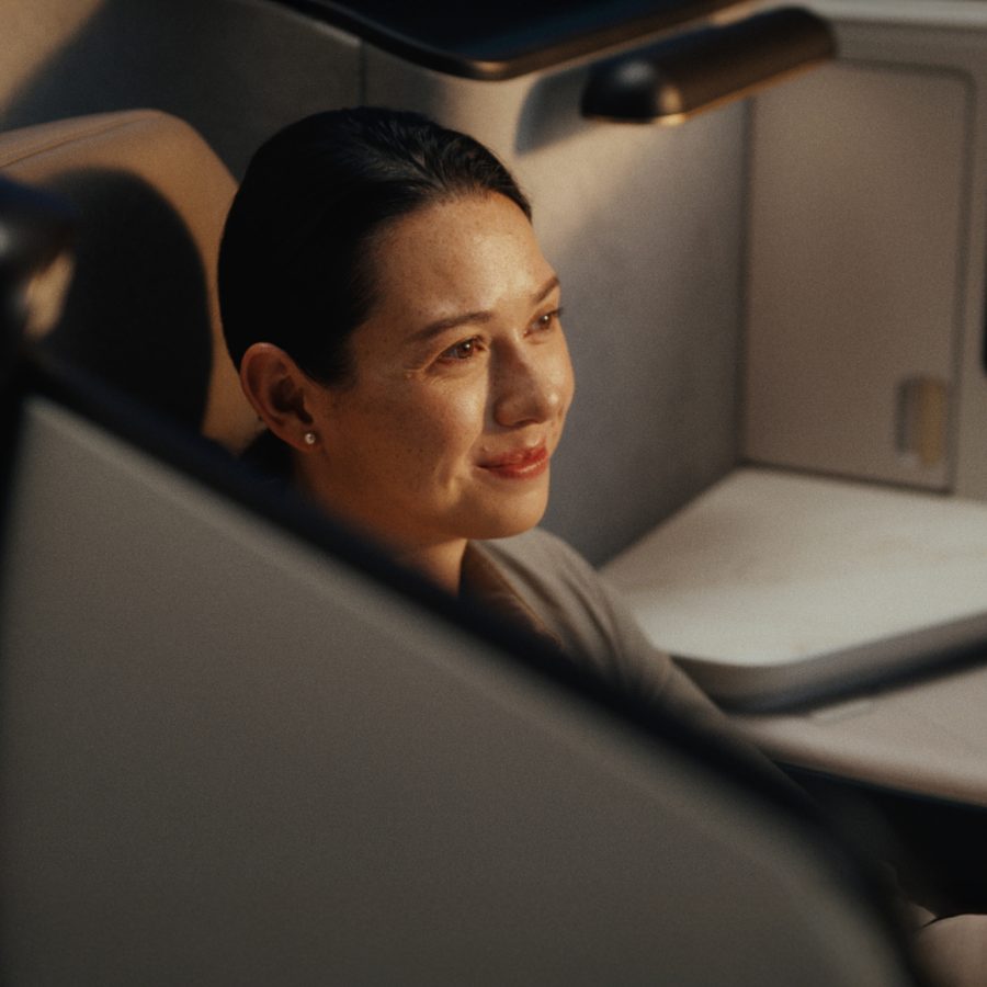 Siobhan Haughey resting in Aria Suite, Cathay Pacific's Business cabin.