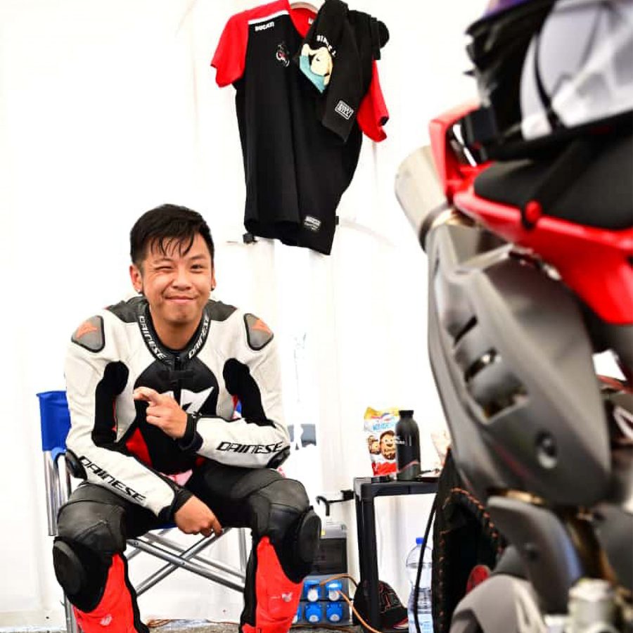 Cathay Diamond member Eric Chau winking at the camera.