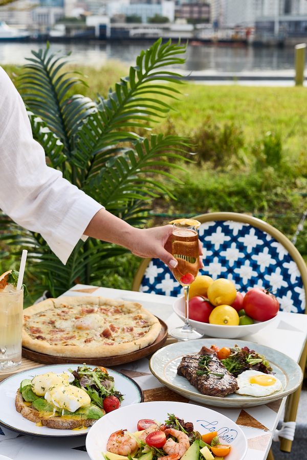 A plate covered in pizzas and other dishes at La Baia.