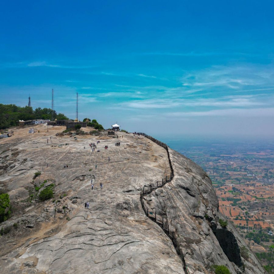 Sunrise over misty hills and valleys seen from Nandi Hills near Bengaluru