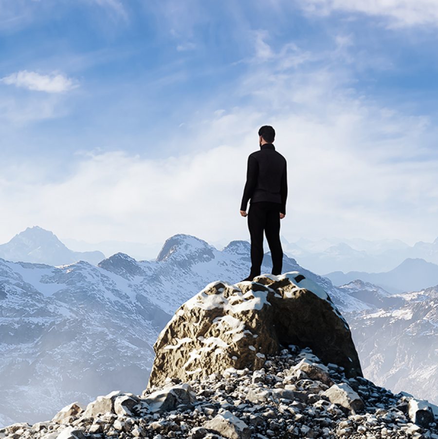 Men on mountain summits