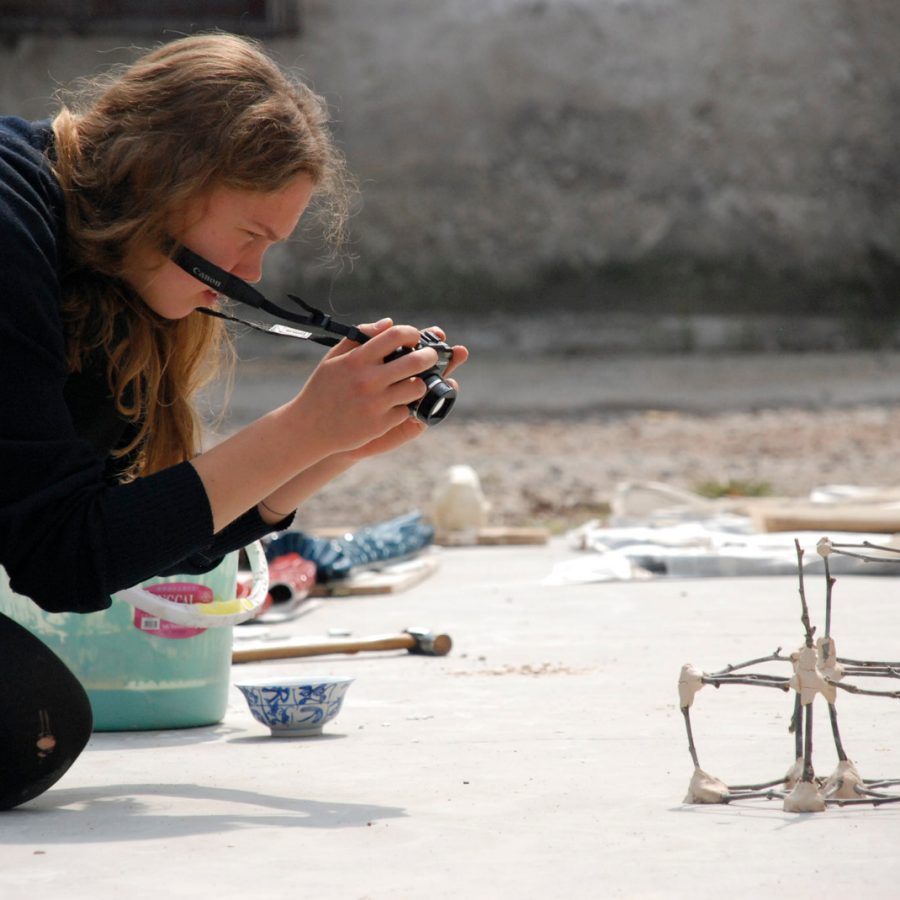 Archeologist taking photo