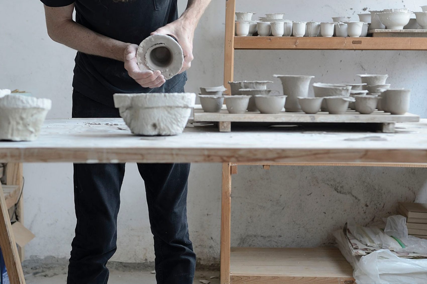 Artist in pottery studio