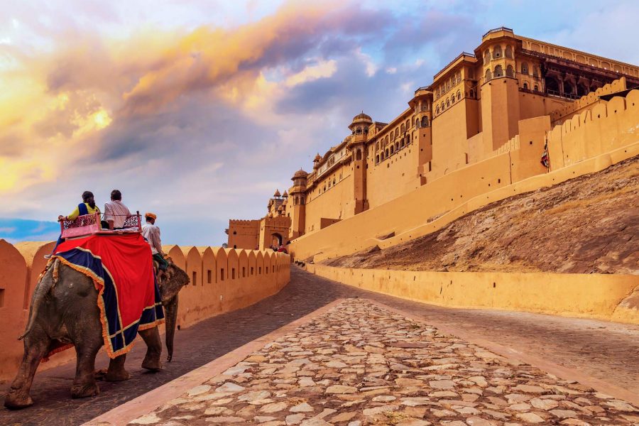 An elephant ride at sunset by the Amber Fort, Jaipur, India. Credit: Roop Dey / Alamy Stock Photo