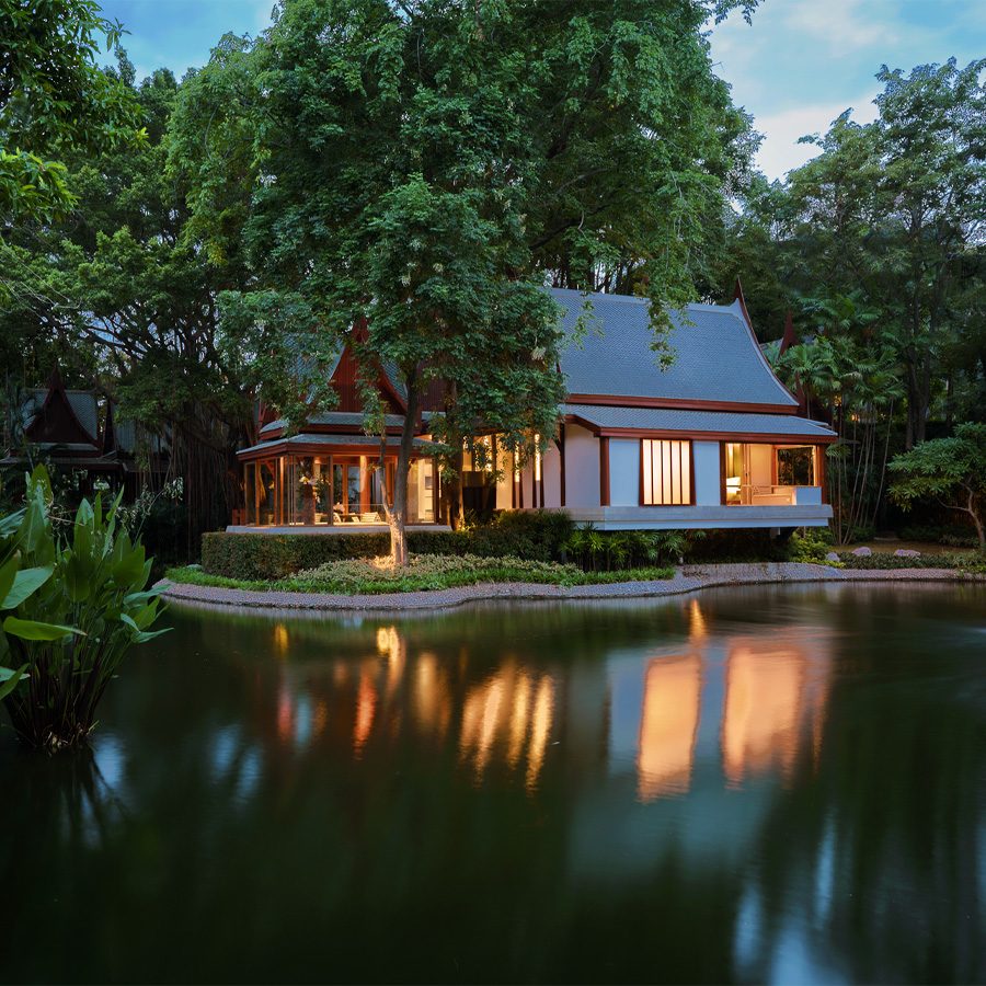 An exterior view of Chiva-Som by the lake, surrounded by nature in Hua Hin, Thailand 