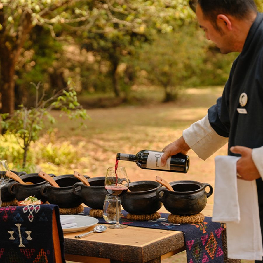 serving wine in Amankora Bhutan