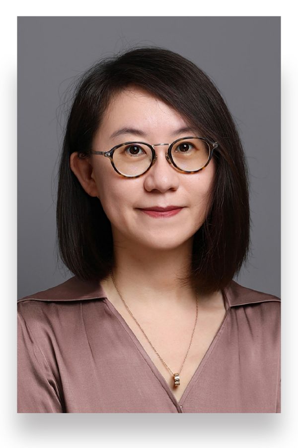 Voyage Editor-in-Chief Zoe Chu smiles in a portrait.