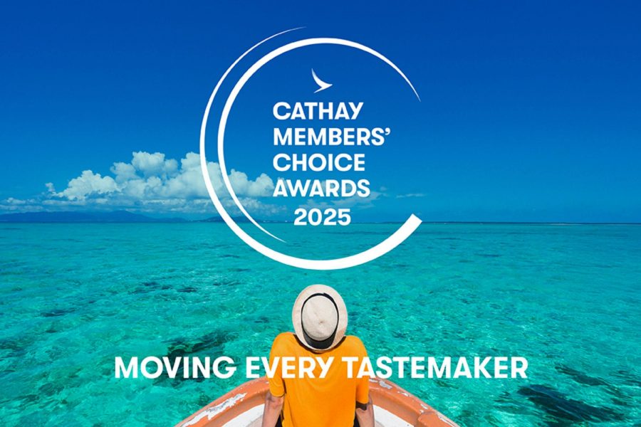 Back view of a person sitting on a boat's edge, looking out at a bright turquoise sea and blue sky. The Cathay Members Choice Awards 2025 logo is overlaid.