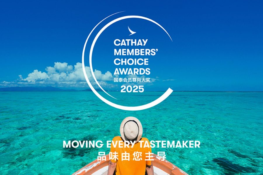 Back view of a person sitting on a boat's edge, looking out at a bright turquoise sea and blue sky. The Cathay Members Choice Awards 2025 logo is overlaid.