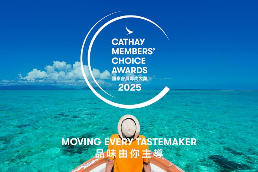 Back view of a person sitting on a boat's edge, looking out at a bright turquoise sea and blue sky. The Cathay Members Choice Awards 2025 logo is overlaid.
