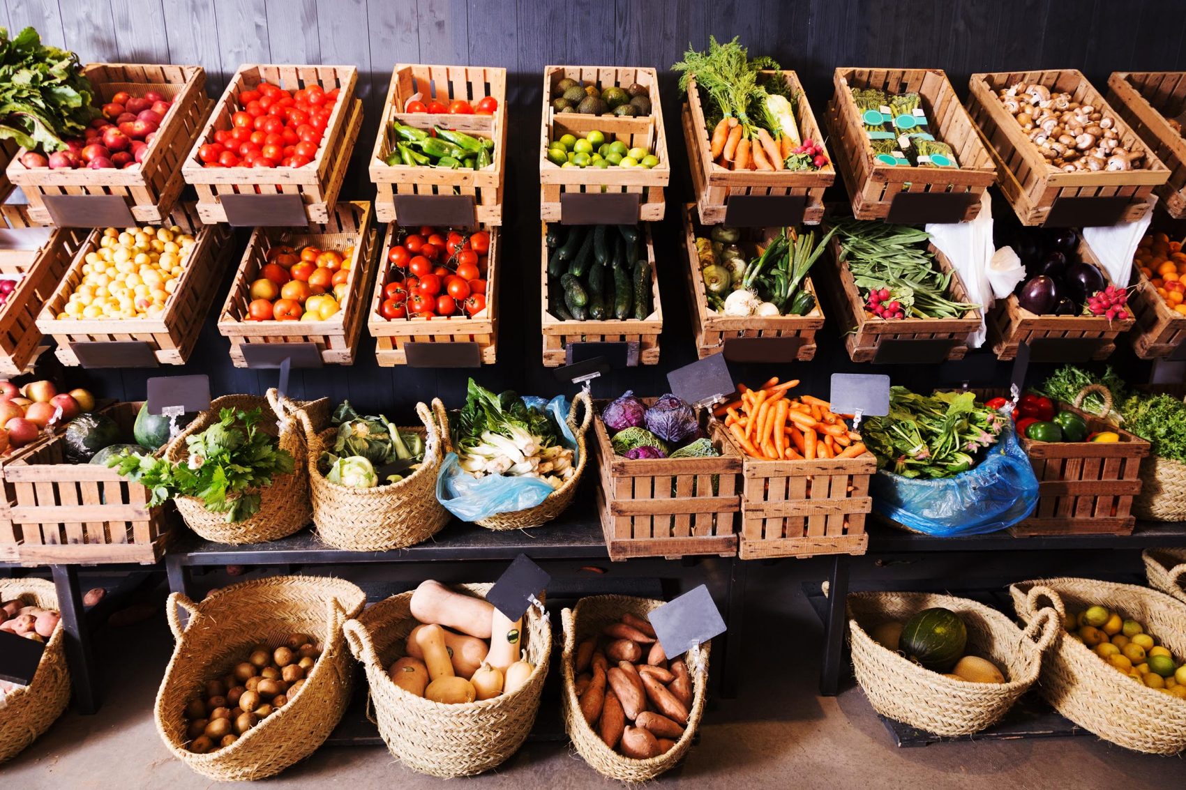 Baskets of fruits and vegetables in a store