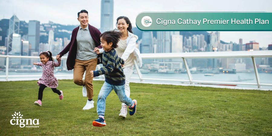 family running on the grass