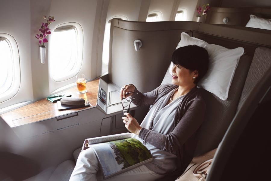 Smiling lady in the first class
